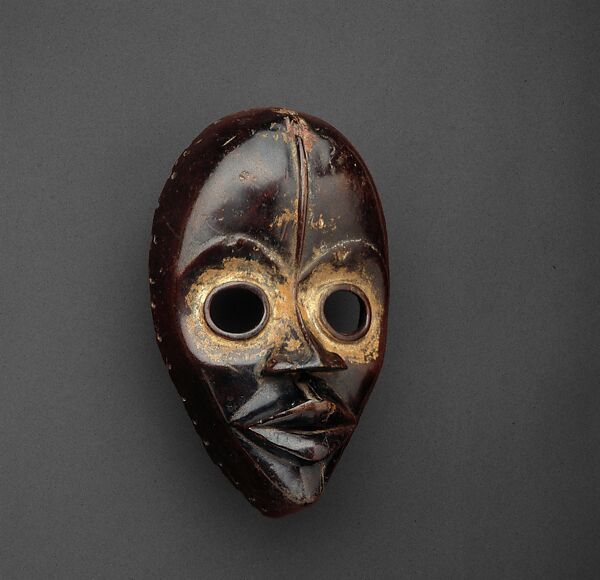 Gunyege face mask, Dan artist, Wood, pigment, kaolin, Dan peoples