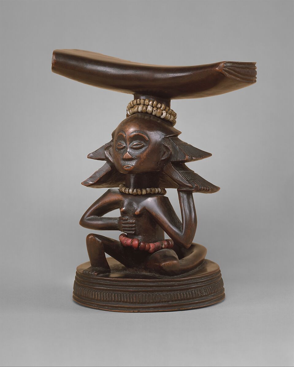 Musamo (headrest), "Master of the Cascade Coiffure", Wood, glass beads, plant fiber, Luba peoples