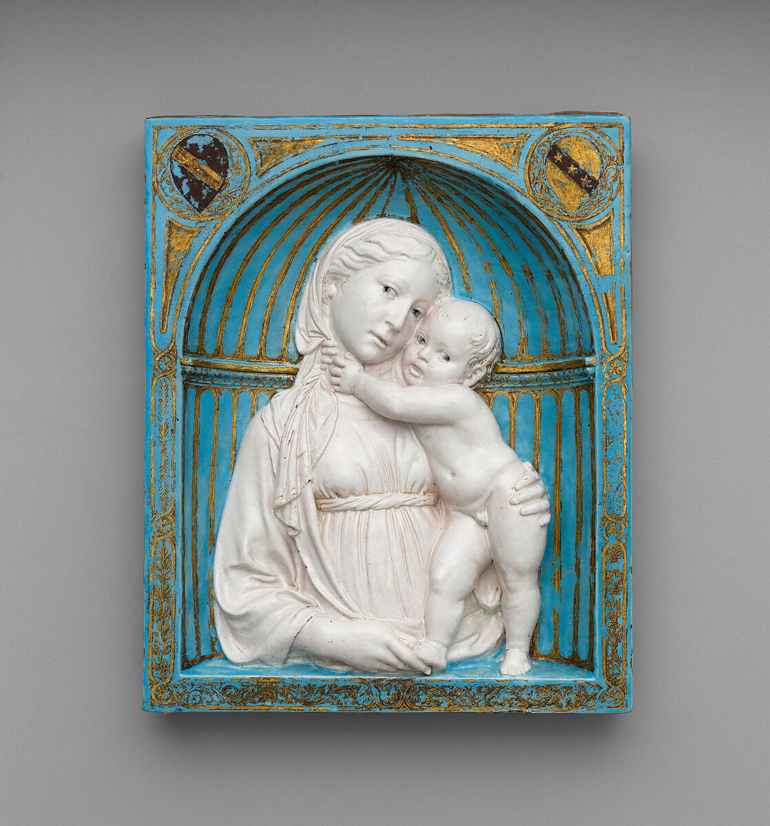 Virgin and Child in a niche, Luca della Robbia Italian, Glazed terracotta with gilt and painted details, Italian, Florence