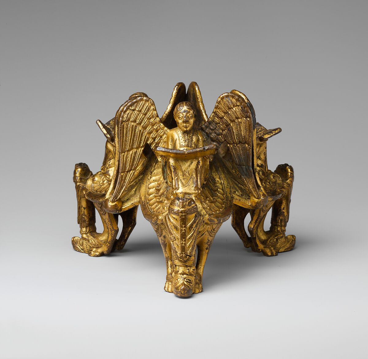 Base of an Altar Cross with Reading Angels Sitting on Dragons and Standing Church Fathers, Gilded copper alloy, North Italian