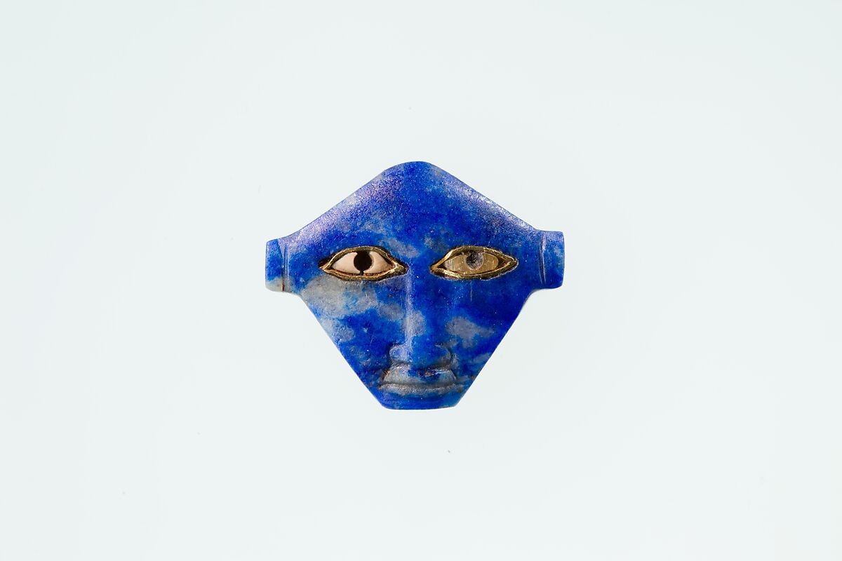 Face of the goddess Bat, Lapis lazuli, gold, travertine (Egyptian alabaster)